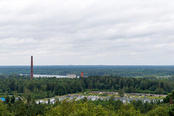 Industrial Landscape Overlooking Forest and Lake