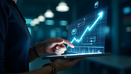 Person analyzing financial growth chart on futuristic holographic display with tablet