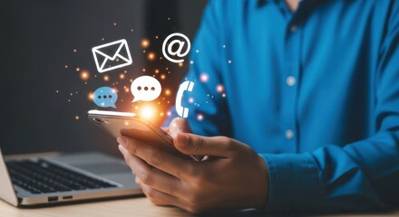 A person is holding a smartphone with contact icons floating above, representing communication and connection in the digital age