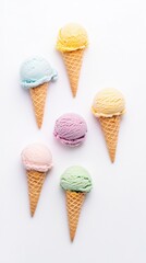 Minimalist overhead photo of pastel-toned mini ice cream cones, isolated on white with copyspace. Ideal for product packaging, food blogs, or refreshing dessert concepts.