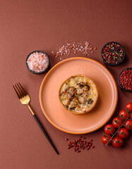 Pie or quiche, a sour tart with chicken and mushrooms, spices and herbs. Round quiche with chicken