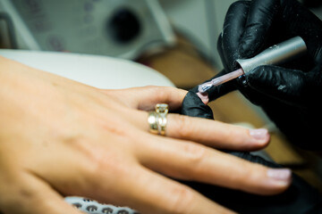 Obraz premium Professional Manicure Process at Modern Beauty Salon