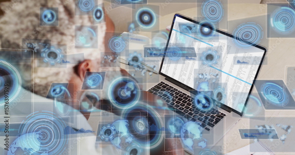 Fototapete leaning analyst analyzing spreadsheets on laptop at desk with ui graphics, copy space