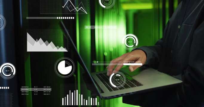 Standing mature Korean IT engineer holding laptop in data center aisle, with overlays, copy space