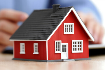 Real estate agent shows property details on tablet