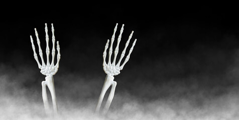 Misty Halloween Skull Hands in Dark Foggy Atmosphere