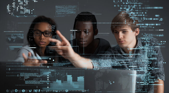 Three people collaborating in front of a computer, pointing at a screen displaying code and data graphs. Stock photo with a dark background and light effects, ideal for tech and teamwork themes.
