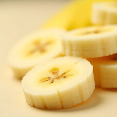 A macro shot of fresh, organic banana slices, showcasing their natural texture and subtle ridges
