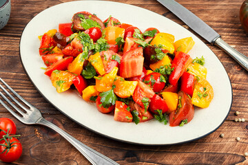 Delicious vegetable salad with fresh tomatoes.
