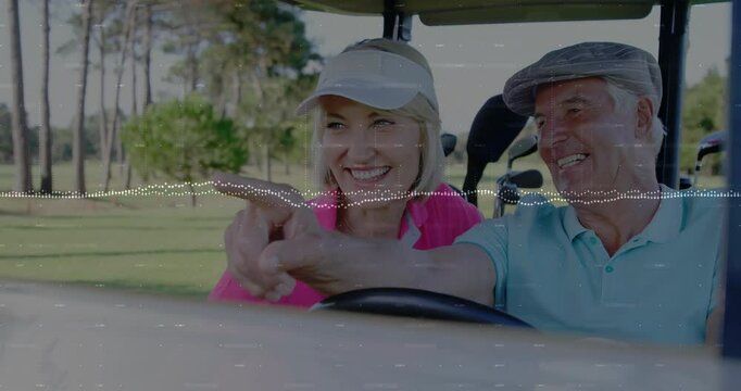 Man gripping wheel initiating pointing and woman sharing laughter in golf cart during sports outing
