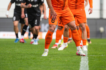 Football player's legs during set  piece