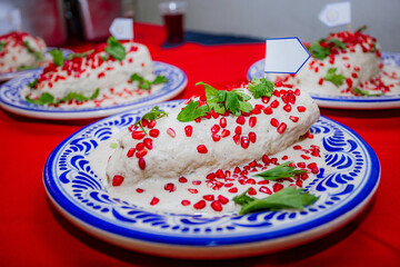 Traditional chile en nogada on Talavera plate
