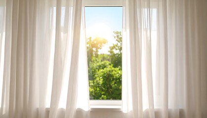 Sunlit window with sheer curtains