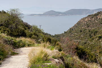 Road to the mountains near the village with sea view (Skyros Island, Greece)