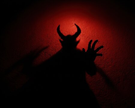 Eerie Shadow of a Horned Beast: Embracing the Fear of the Dark