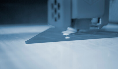 The process of printing on a 3D printer. 3D printer printing object from molten plastic close-up....