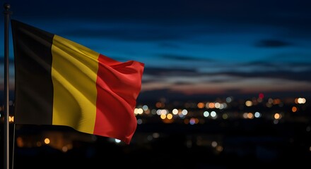 The Belgian flag, prominent against a city's sparkling night skyline, embodies national spirit and the vibrant energy of a European evening.