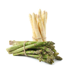 Many raw asparagus spears isolated on white