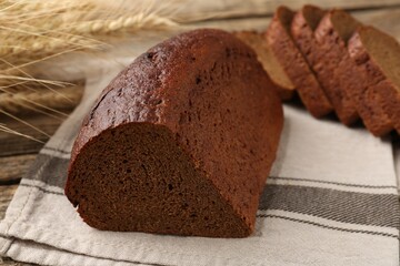 Pieces of fresh rye bread on table, closeup
