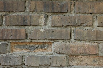Texture of old brick wall as background, closeup