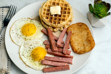 fried  eggs with waffles and spam  sticks