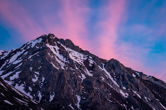 Alpenglow on Snow-Dusted Sierra Peak at Dusk