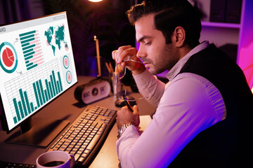 Smart businessman writing memo market data on paper work report folder to analyze sales channel...