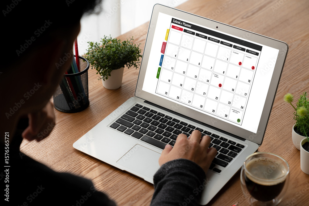 Wall mural calendar on computer software application for modish schedule planning for personal organizer and on