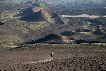 hiker trekking on mount Etna