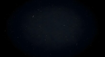 Obraz premium Dark grainy film overlay texture, ideal for adding atmospheric vintage effects and dust particles