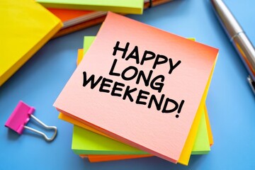 Happy Long Weekend text on notepad, concept blue background.