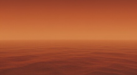 Obraz premium An expansive view of a calm, red-hued ocean under a similarly colored sky.