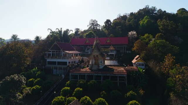 Wat pong yaeng nok buddhist temple, nestled in the lush forests of thailand, presents a serene view