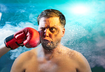 Shocked man getting punched by red boxing glove getting hit in face  with dramatic impact
