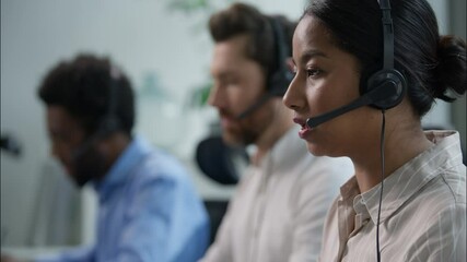 Close up diverse multiethnic business call center operators headset working helpline answering service consulting Indian businesswoman Caucasian African businessmen talking advice callcenter at office - Powered by Adobe