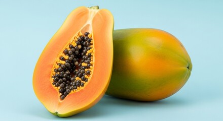 Whole and halved papaya with seeds on a soft pastel background, minimalistic style