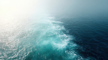 aerial view of vast ocean surface showcases stunning beauty of shimmering sunlight reflected on waves