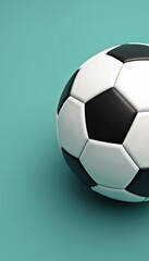 Naklejka premium Classic black and white soccer ball rests on a clean teal background. This image captures the iconic sport equipment, perfect for sports websites, team promotions, or athletic apparel advertising.