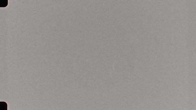 Vintage 16 mm Film Overlay with Visible Sprockets, Grunge Imperfection, Flicker and Dust Texture
