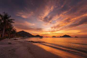 stunning tropical sunsets over ocean in various countries showcasing vibrant colors and serene landscapes