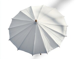 Top view of a large white outdoor umbrella casting shadows on its fabric on a bright background