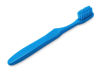 Blue toothbrush resting on transparent surface, representing essential personal dental cleaning routine