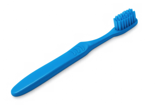 Blue toothbrush resting on transparent surface, representing essential personal dental cleaning routine