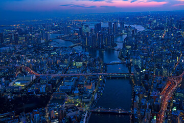 隅田川中洲上空から湾岸を望む・都市風景の夕暮れAerial view