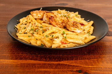 Penne pasta with grilled shrimp