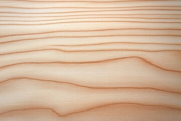 Close-up image of smooth wooden surface with natural grain patterns and warm light brown tones