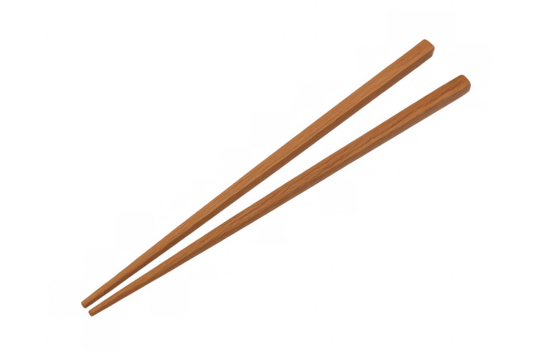 Pair of wooden chopsticks lying parallel on a transparent background, ready for use in asian cuisine