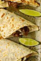 Soft Flour Tacos with Beef and Chicken, Cheese and Lime