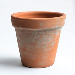 Close-up of an empty weathered terracotta flower pot with natural clay texture and white mineral stains on a white background