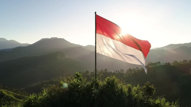 Indonesian flag glowing in golden sunlight behind